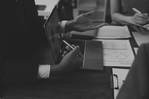 Marketing leaders reviewing performance data on AI adoption for commercial growth